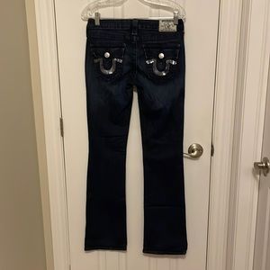 Ladies True Religion dark denim stretch. Size 27. Sequin pocket trim.